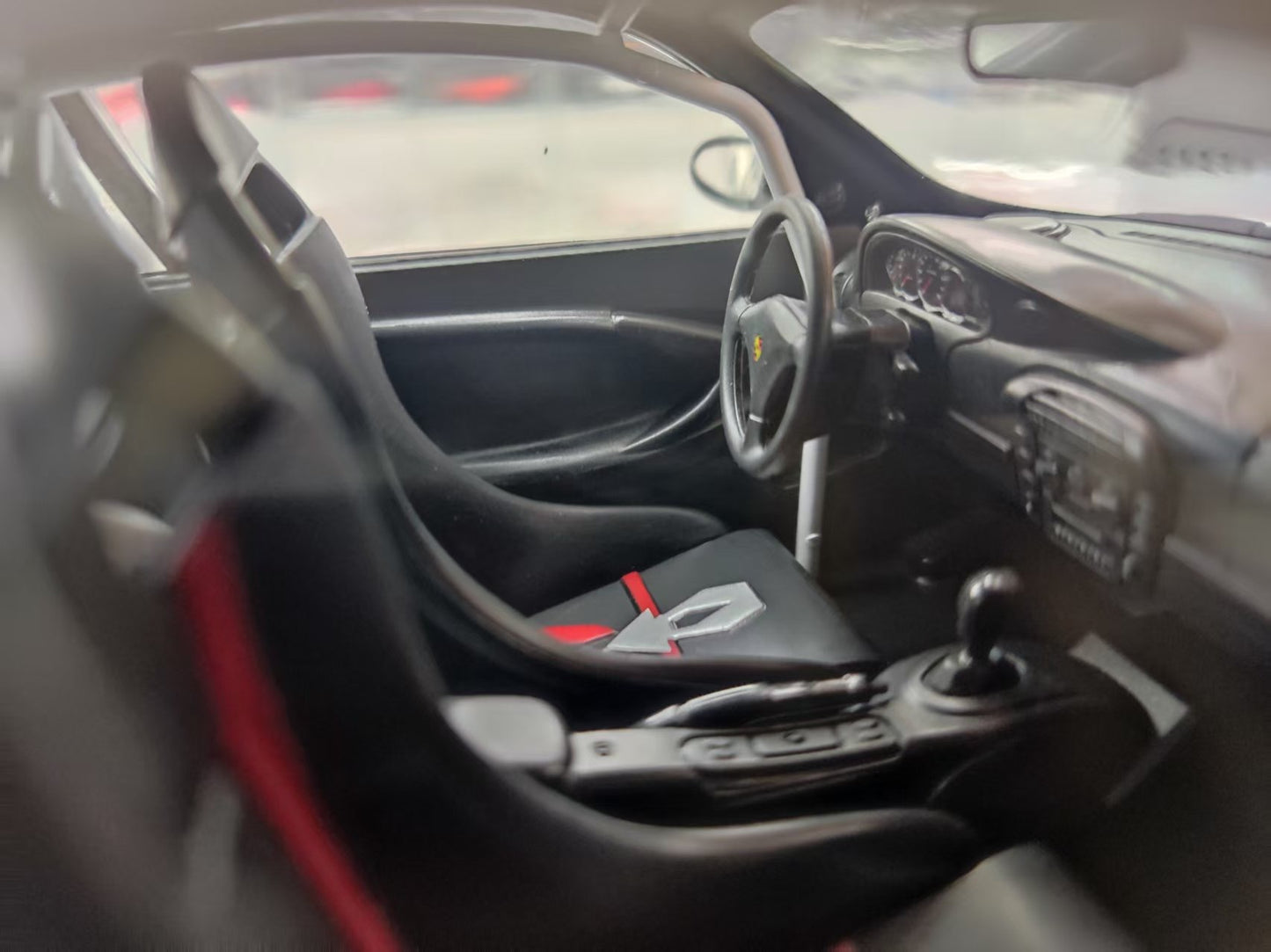 MINICHAMPS 1/18 Porsche 911 GT3 RS - 2002 White with Blue Stripes 155062021