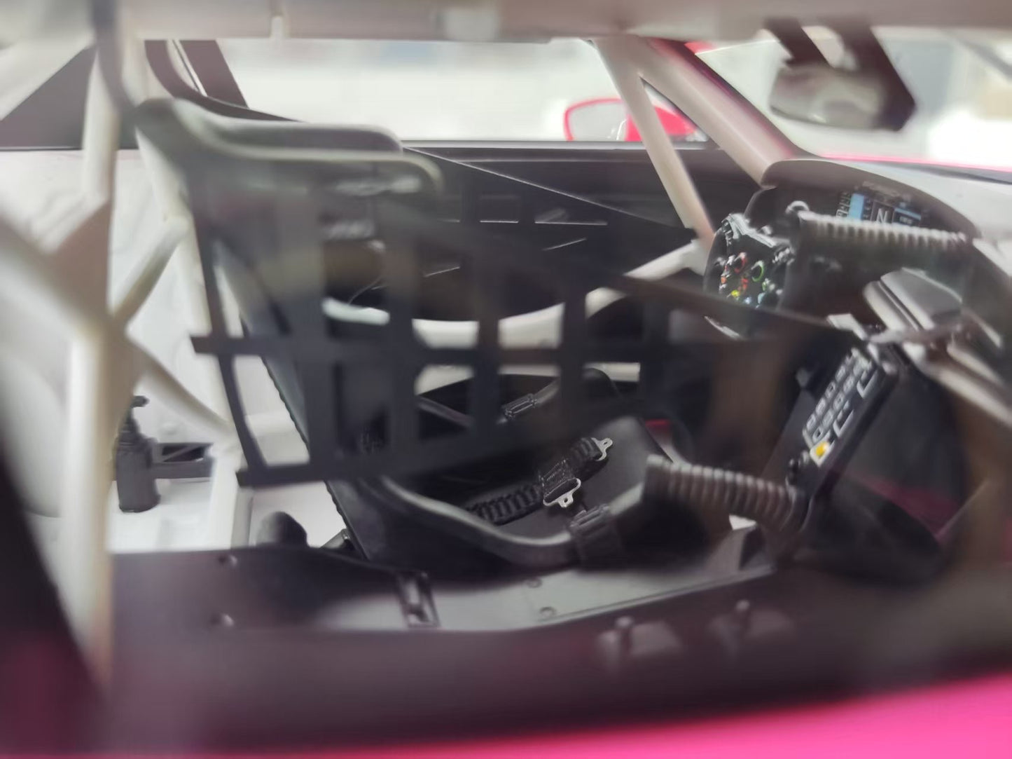 Topspeed 1/18 Porsche 911 GT3 R #77 AO Racing 2024 IMSA Road America, Pink Dinosaur Livery, TS0617