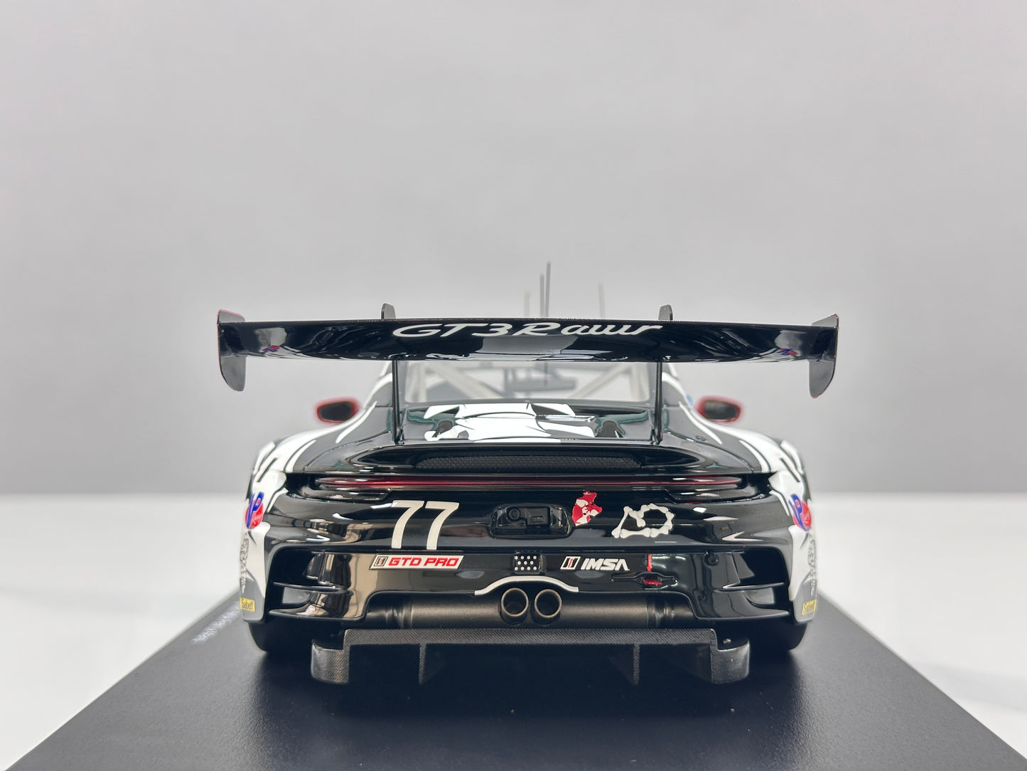 Topspeed 1/18 Porsche 911 GT3 R #77 AO Racing 2025 IMSA Petit Le Mans Skeleton Dragon Livery TS0651