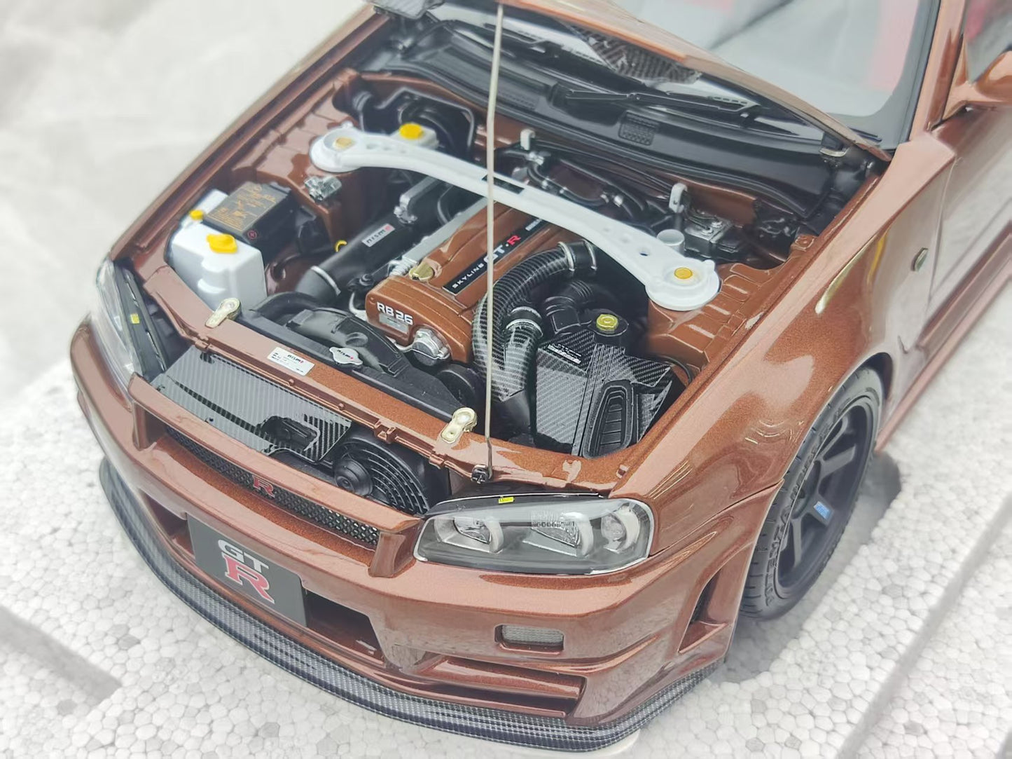 MOTORHELIX 1/18 Nissan Skyline GT-R (R34) CUSTOMIZED VERSION Metal Bronze MH319