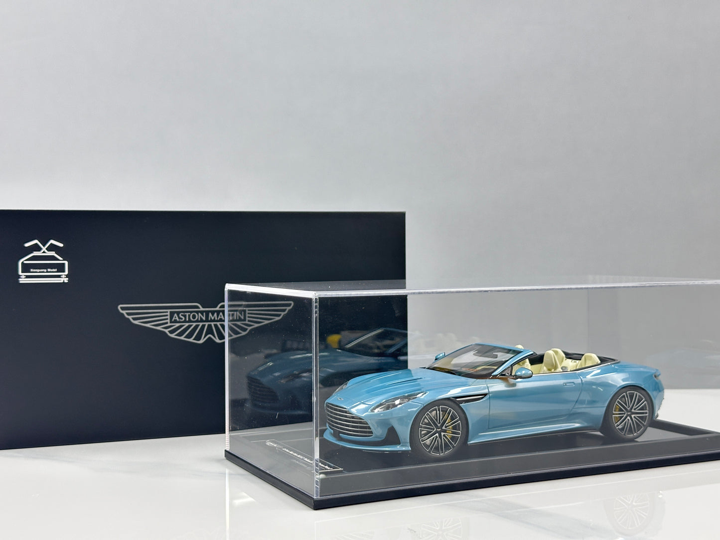Xiaoguang Model & MotorHelix 1/18 Aston Martin DB12 Volante Convertible – Caribbean Blue (MH384)