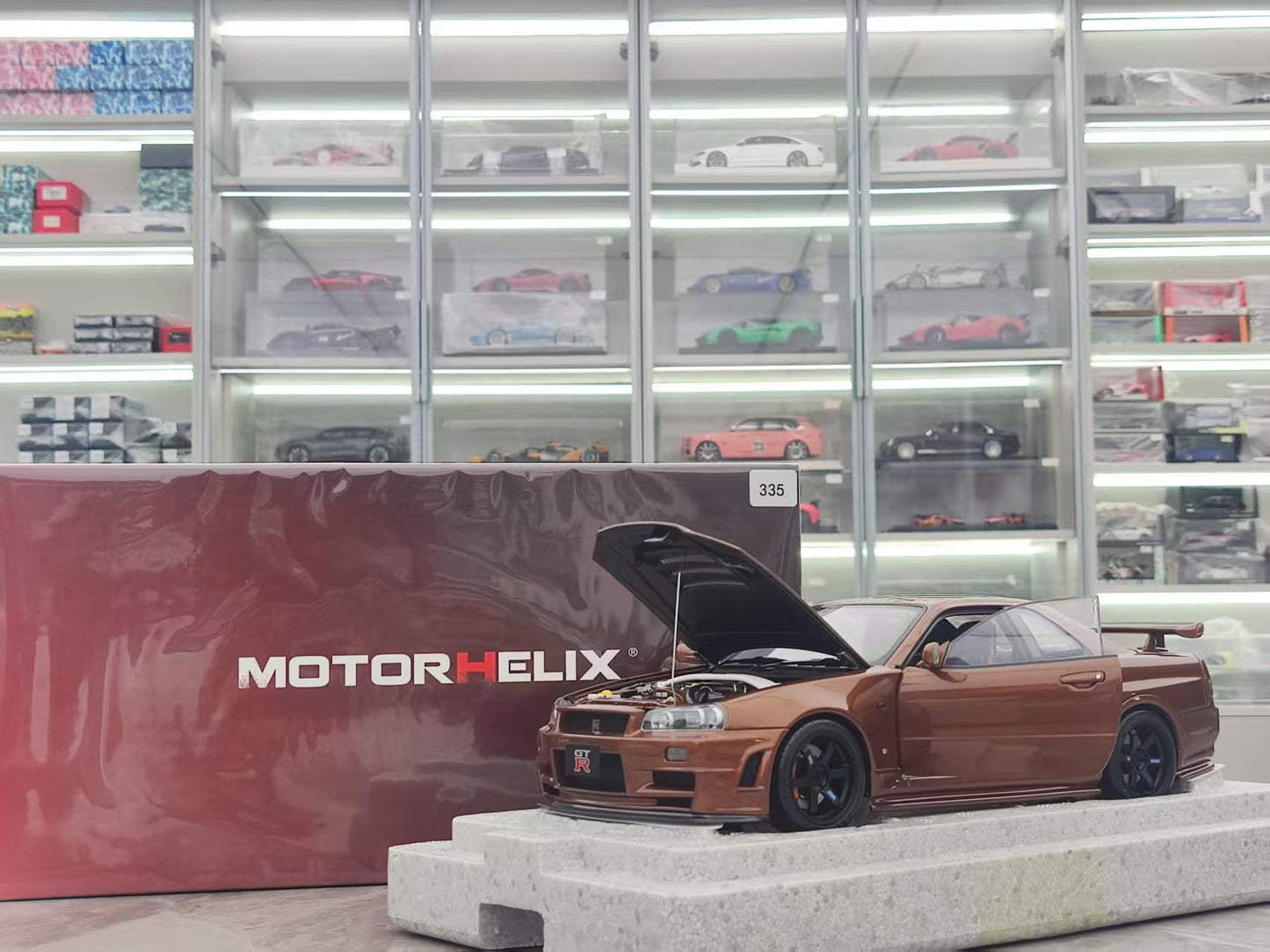 MOTORHELIX 1/18 Nissan Skyline GT-R (R34) CUSTOMIZED VERSION Metal Bronze MH319