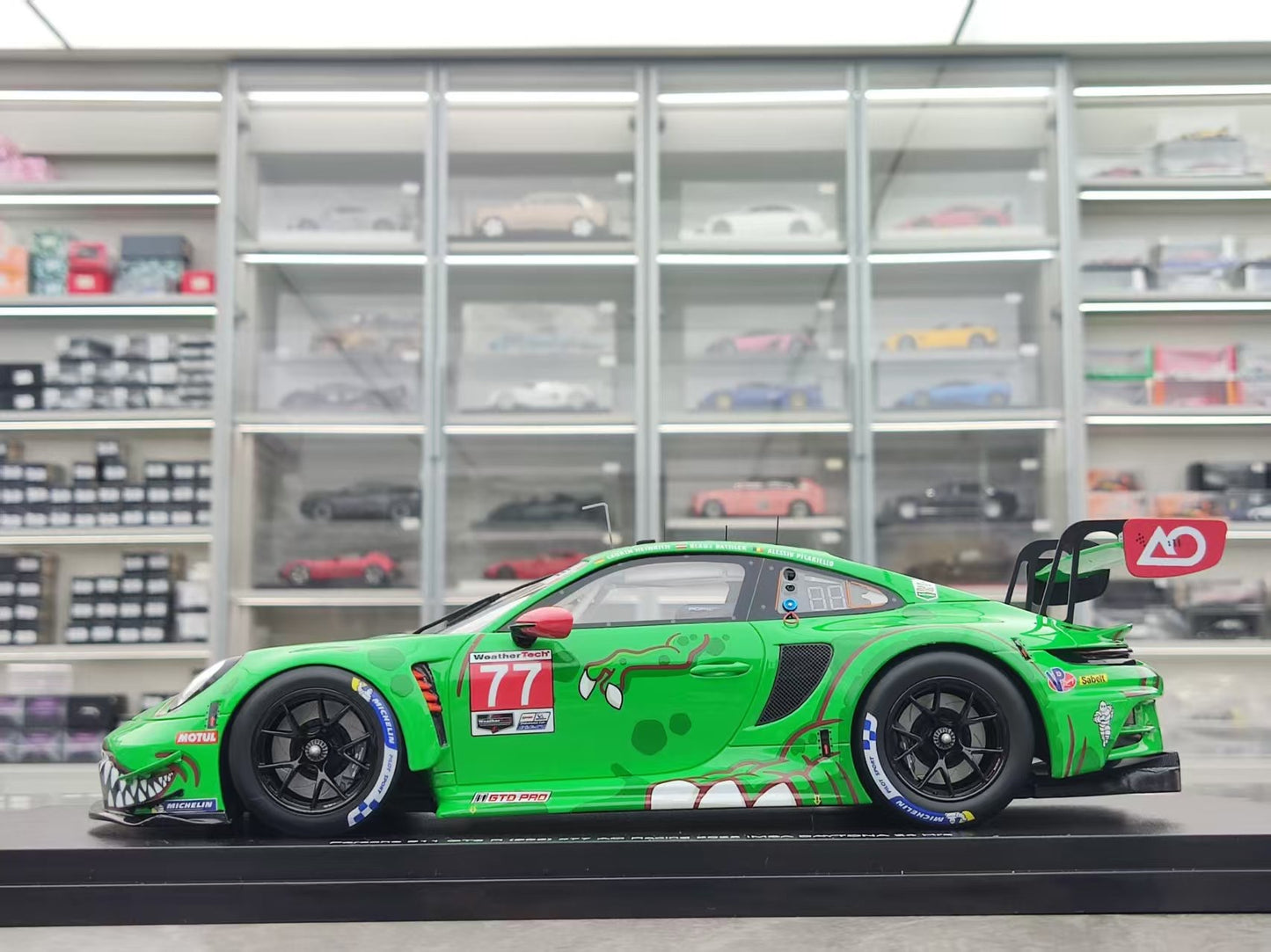 Topspeed 1/18 Porsche 911 GT3 R (992) #77 AO Racing 2025 Green Dinosaur TS0642
