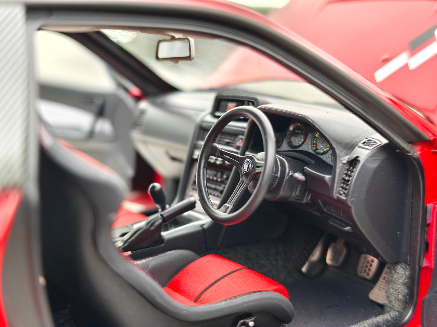 MOTORHELIX 1/18 Nissan Skyline GT-R (R34) Customized Version, Red MH328