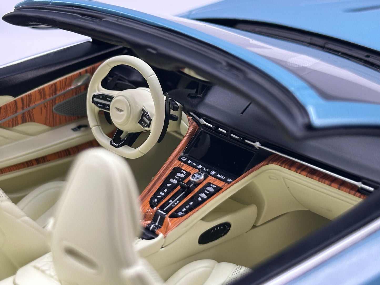 Xiaoguang Model & MotorHelix 1/18 Aston Martin DB12 Volante Convertible – Caribbean Blue (MH384)