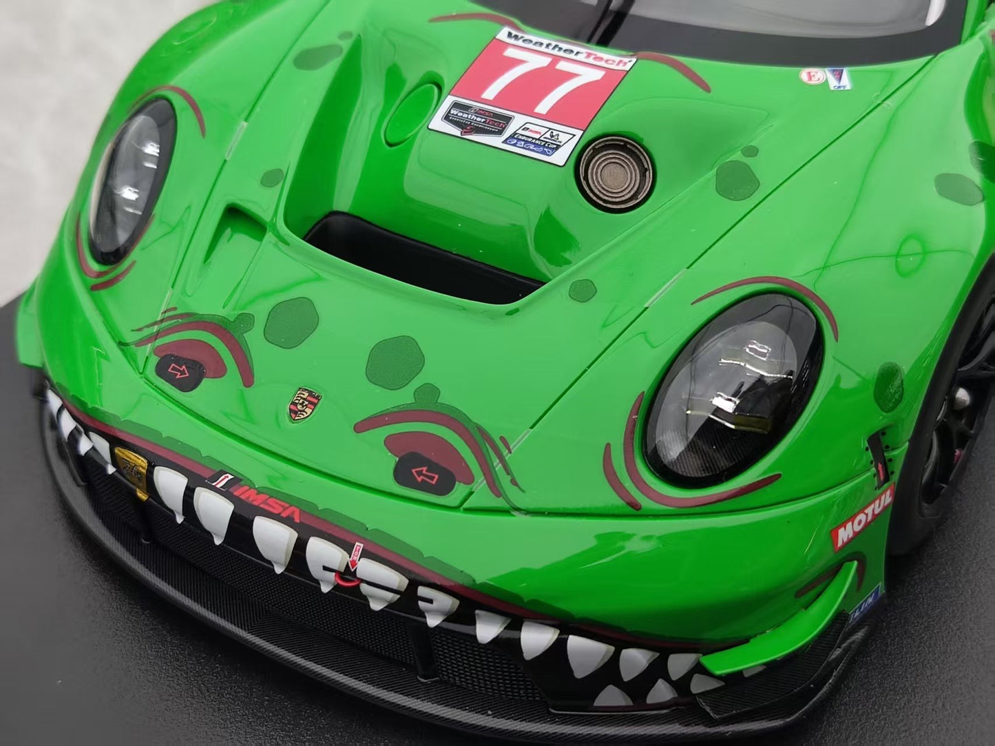 Topspeed 1/18 Porsche 911 GT3 R (992) #77 AO Racing 2025 Green Dinosaur TS0642
