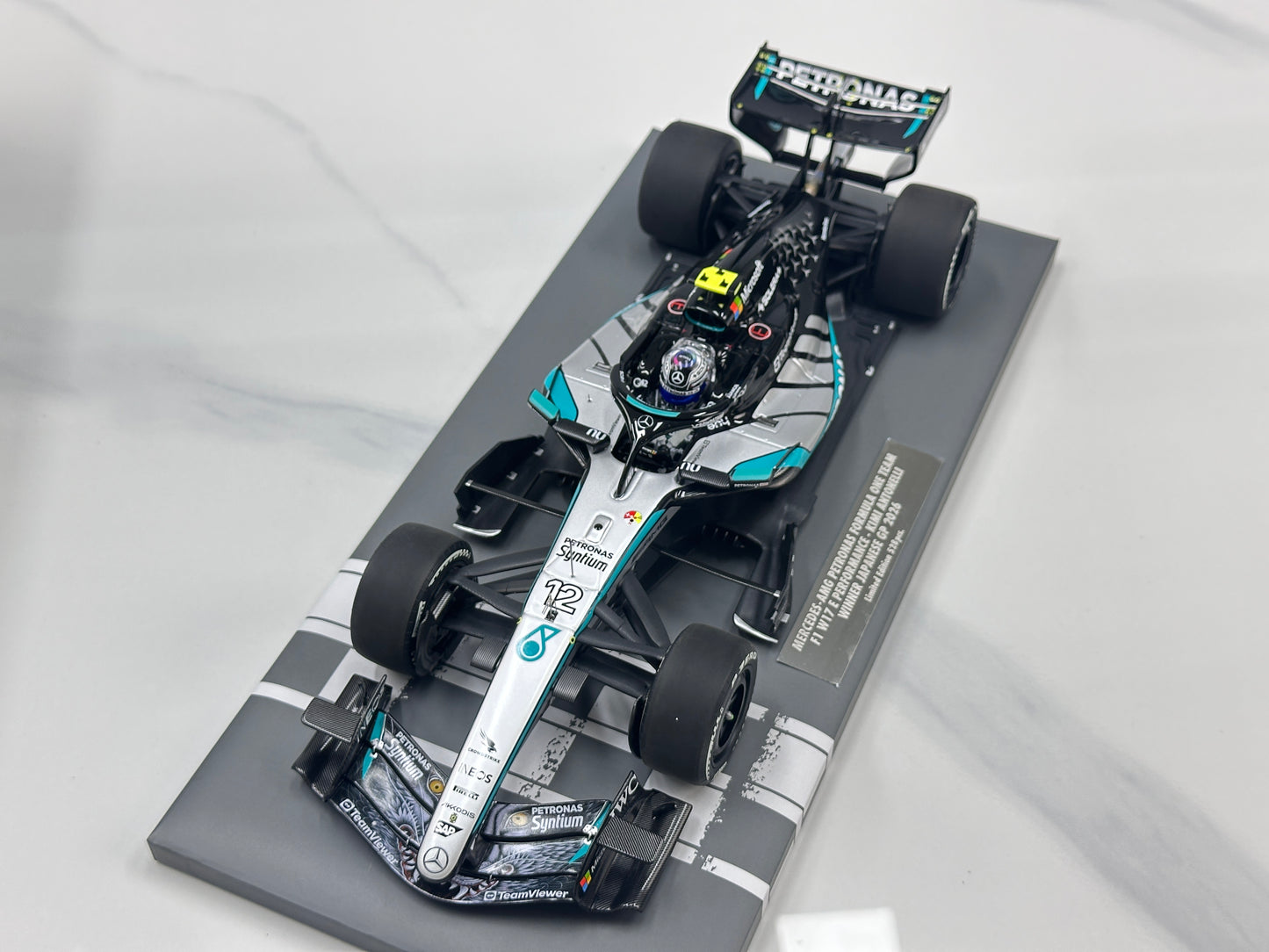 MINICHAMPS 1/18 Mercedes-AMG PETRONAS F1 Team W17 (K. Antonelli – 2026 Japanese Grand Prix Winner) – Silver Livery (117260312)