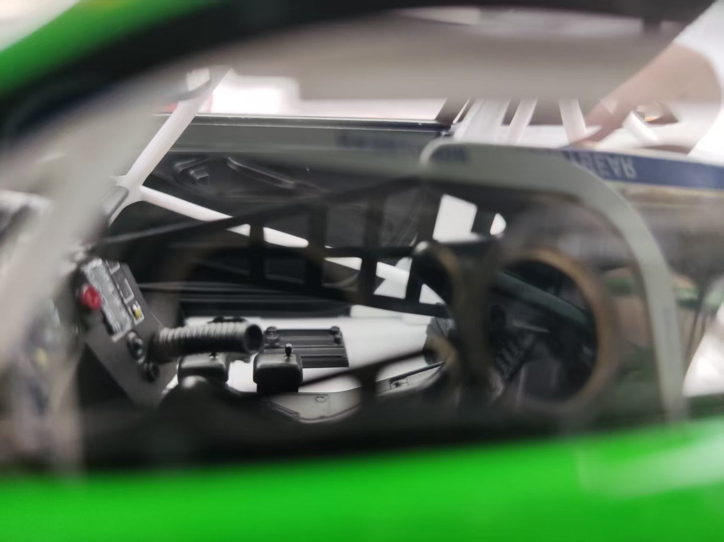 Topspeed 1/18 Porsche 911 GT3 R (992) #77 AO Racing 2025 Green Dinosaur TS0642