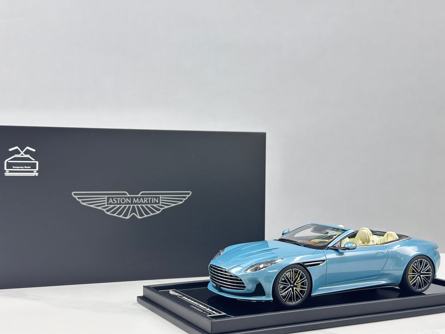 Xiaoguang Model & MotorHelix 1/18 Aston Martin DB12 Volante Convertible – Caribbean Blue (MH384)