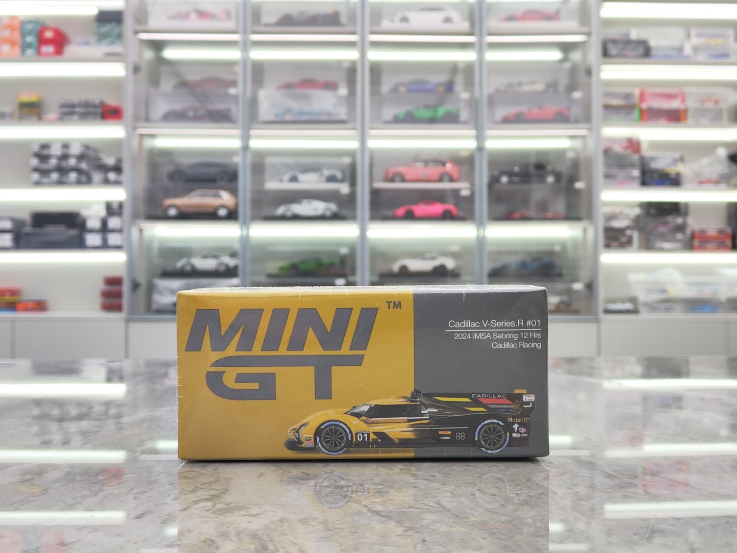 MINIGT 1/64 Cadillac V-Series.R #01 Cadillac Racing 2024 in black and yellow MGT01004